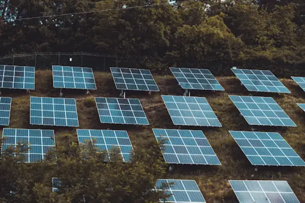blue-solar-panels-on-green-grass-field