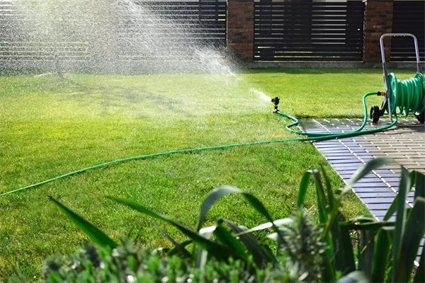 Efficient outdoor sprinkler system delivering controlled lawn irrigation.