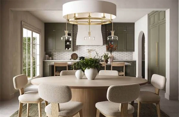Open-plan living and dining area lit by layered lighting, with pendants over the table and lamps at the edges of the room